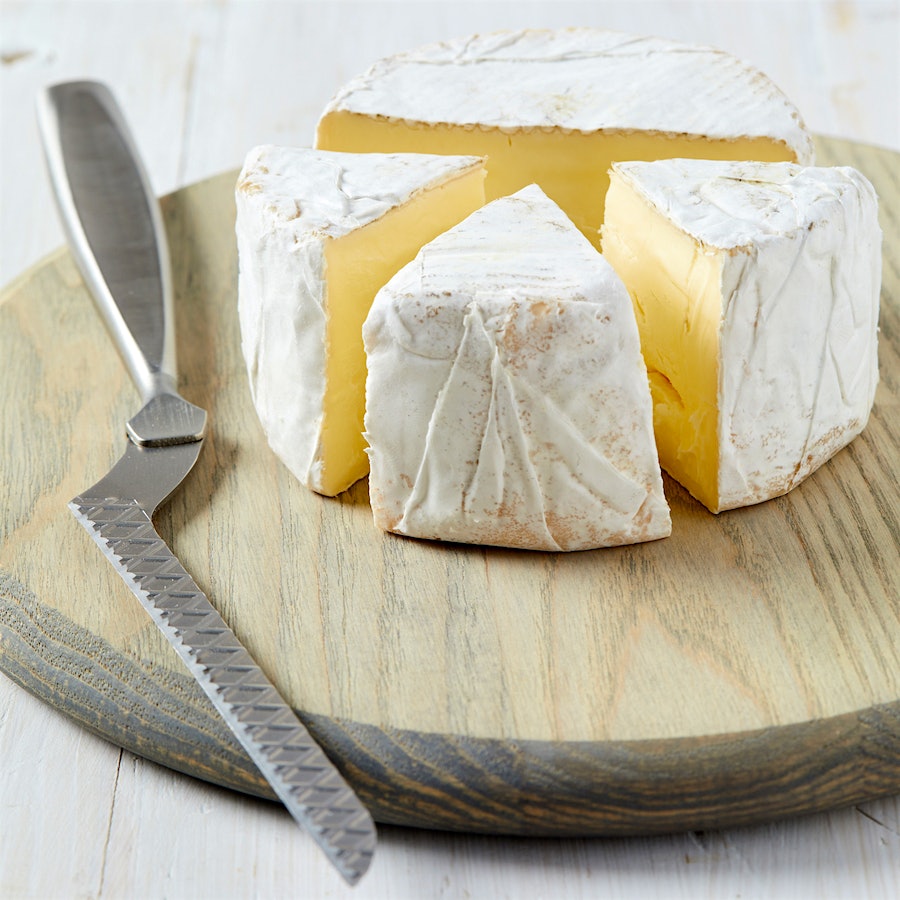 Slice round cheeses into wedges.